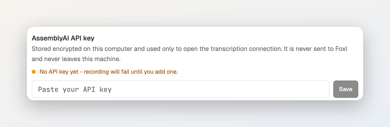 The AssemblyAI API key field in Foxl's Recording settings: Stored encrypted on this computer and used only to open the transcription connection. No API key yet. An empty field reading Paste your API key, and a Save button.