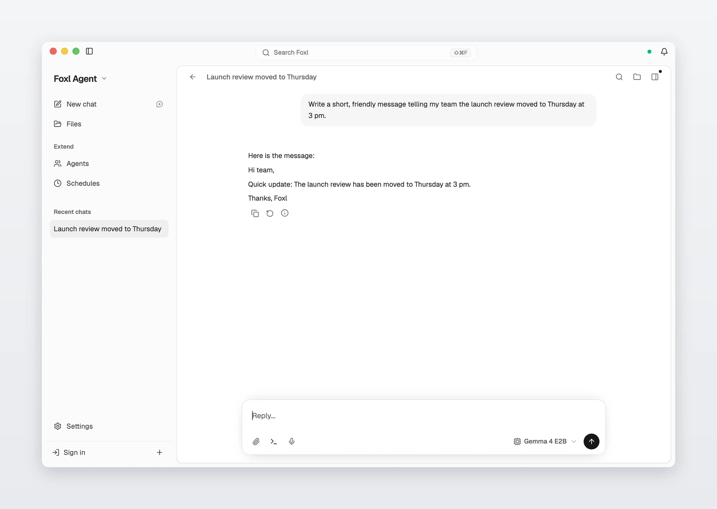 A Foxl Agent chat with Gemma 4 E2B in the model menu under the message box. Asked for a short, friendly message that the launch review moved to Thursday at 3 pm, it answers: Hi team, Quick update: The launch review has been moved to Thursday at 3 pm. Thanks, Foxl.